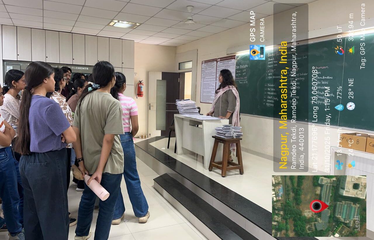 B. Tech First Year Faculty giving instructions to students in Chemistry Lab Photo 4